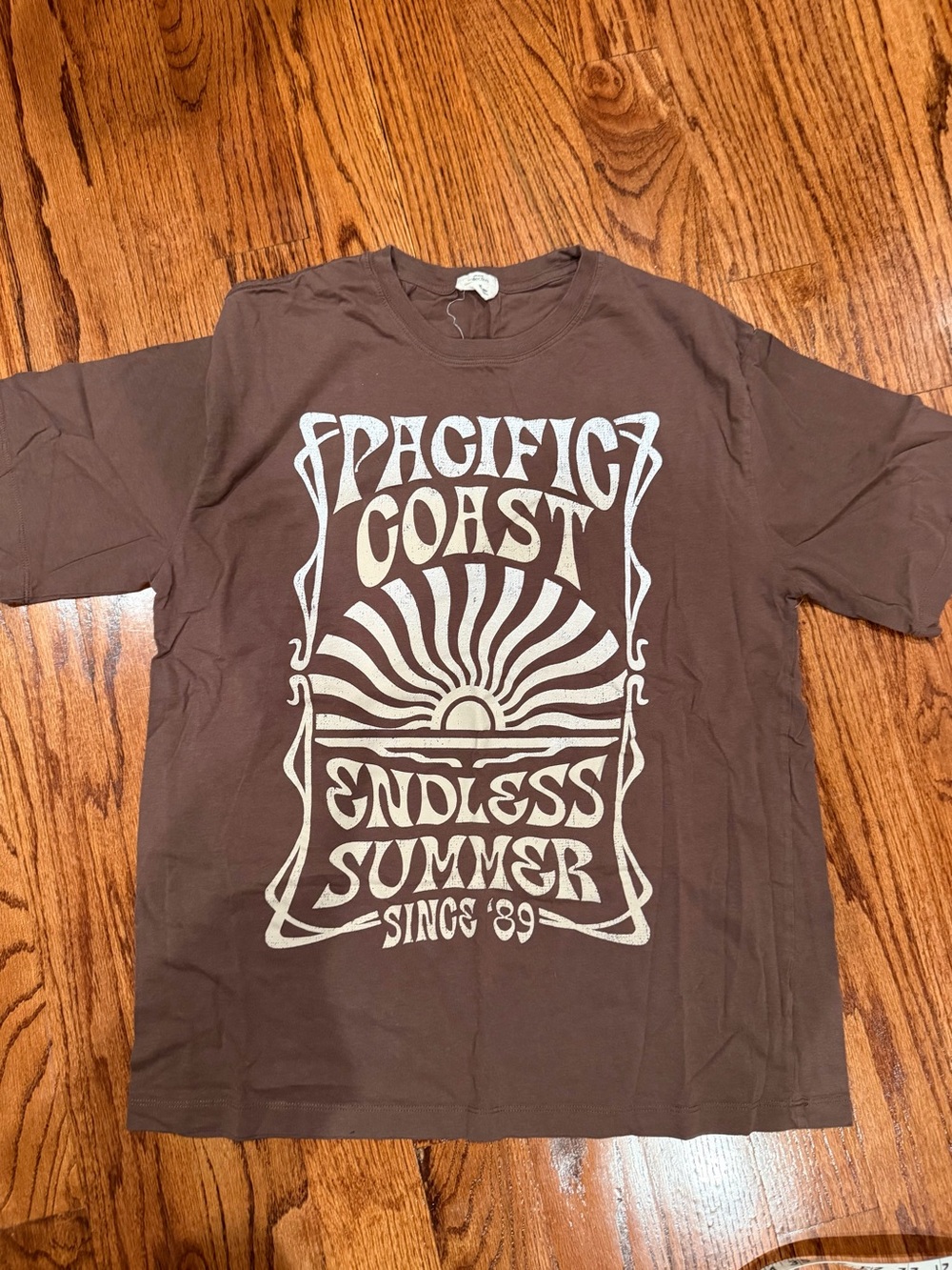 Ardene Brown Tee with Cream Retro 'Pacific Coast' Graphic